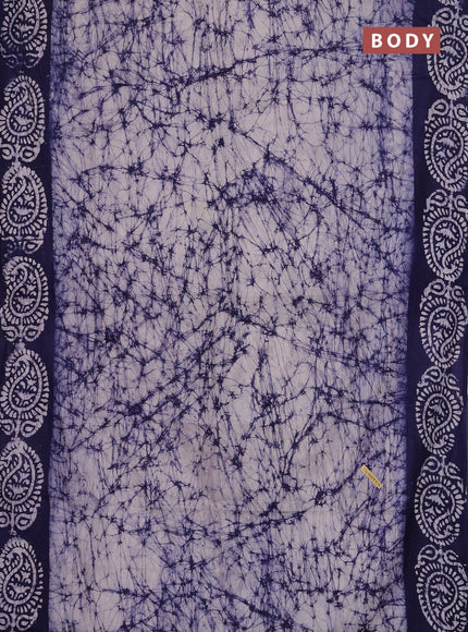 Batik cotton saree off white and navy blue with allover prints and batik printed border