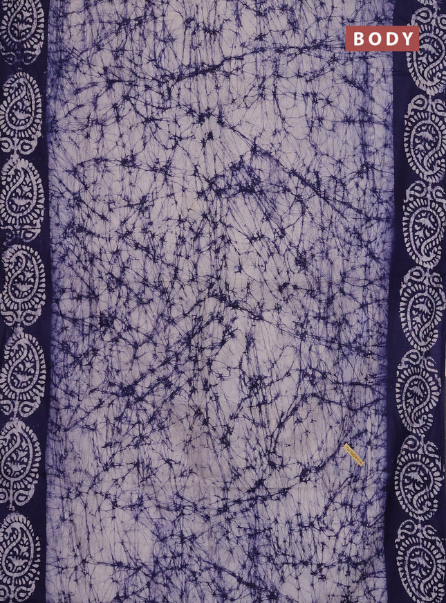 Batik cotton saree off white and navy blue with allover prints and batik printed border