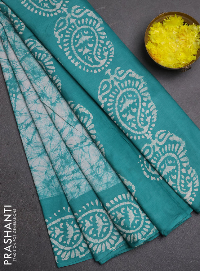 Batik cotton saree teal green with allover prints and batik printed border