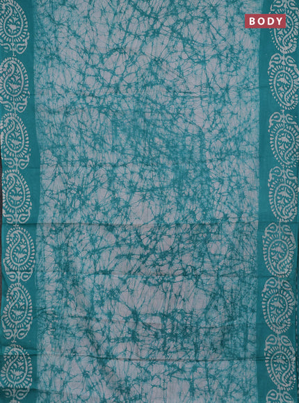 Batik cotton saree teal green with allover prints and batik printed border