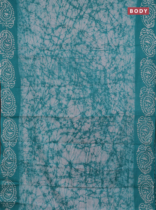 Batik cotton saree teal green with allover prints and batik printed border