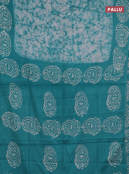 Batik cotton saree teal green with allover prints and batik printed border