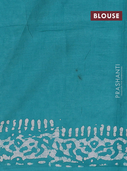 Batik cotton saree teal green with allover prints and batik printed border