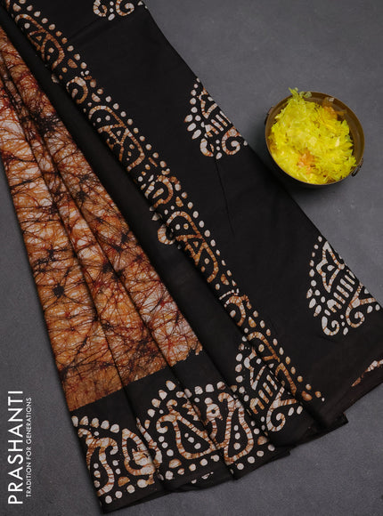 Batik cotton saree dark mustard and coffee brown with allover prints and batik printed border