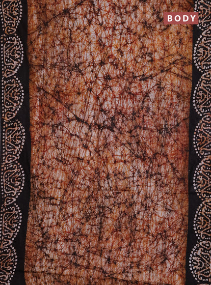 Batik cotton saree dark mustard and coffee brown with allover prints and batik printed border
