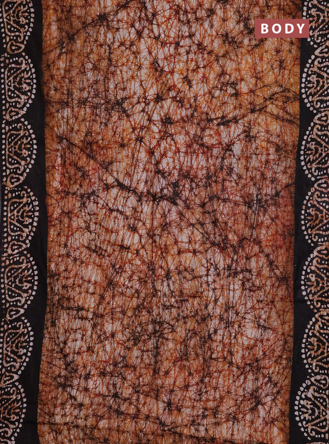 Batik cotton saree dark mustard and coffee brown with allover prints and batik printed border