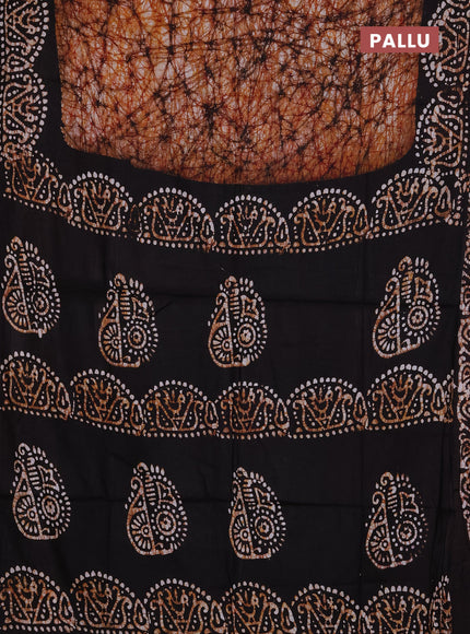 Batik cotton saree dark mustard and coffee brown with allover prints and batik printed border