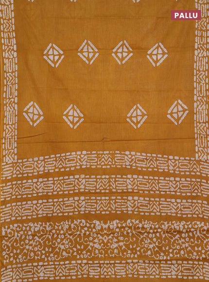 Batik cotton saree mustard yellow with batik butta prints and batik printed border
