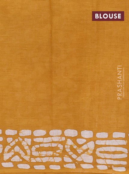 Batik cotton saree mustard yellow with batik butta prints and batik printed border