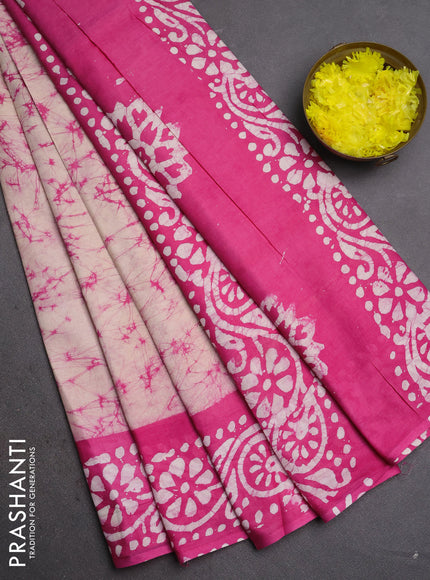 Batik cotton saree beige and pink with allover prints and batik printed border