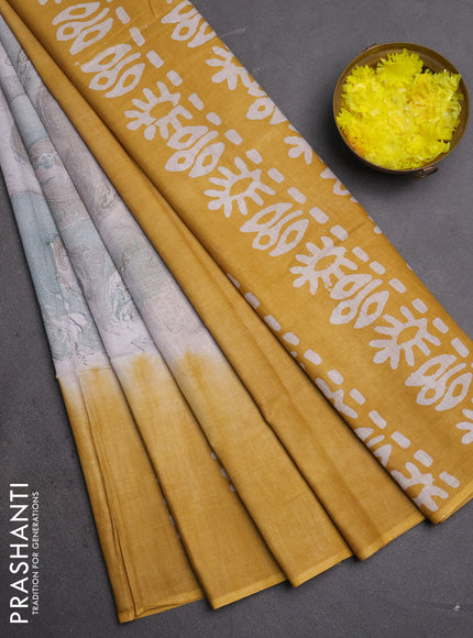 Batik cotton saree multi colour and mustard yellow with allover prints and batik printed border