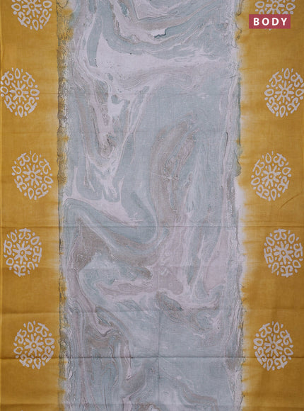 Batik cotton saree multi colour and mustard yellow with allover prints and batik printed border
