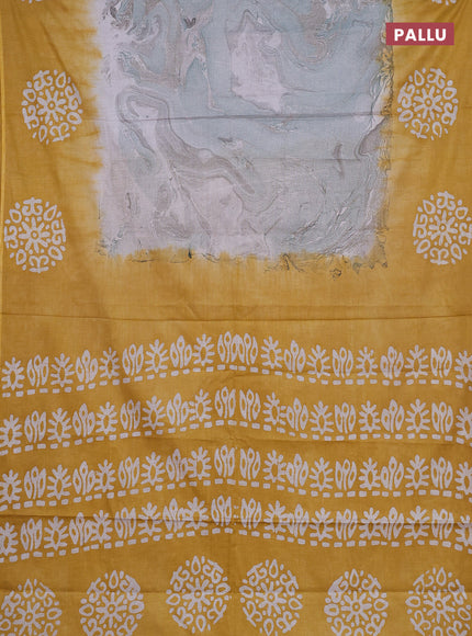 Batik cotton saree multi colour and mustard yellow with allover prints and batik printed border