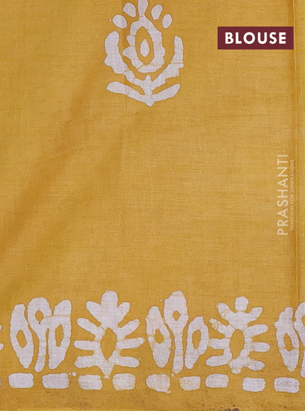 Batik cotton saree multi colour and mustard yellow with allover prints and batik printed border