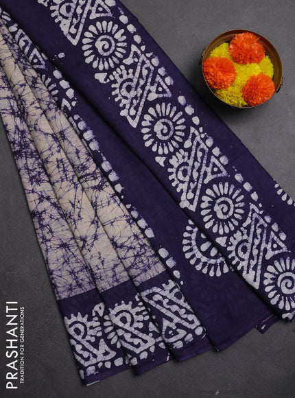 Batik cotton saree beige and violet with allover prints and batik printed border