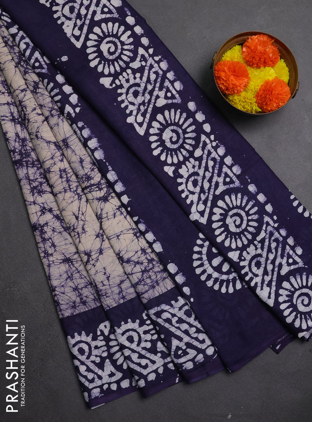 Batik cotton saree beige and violet with allover prints and batik printed border