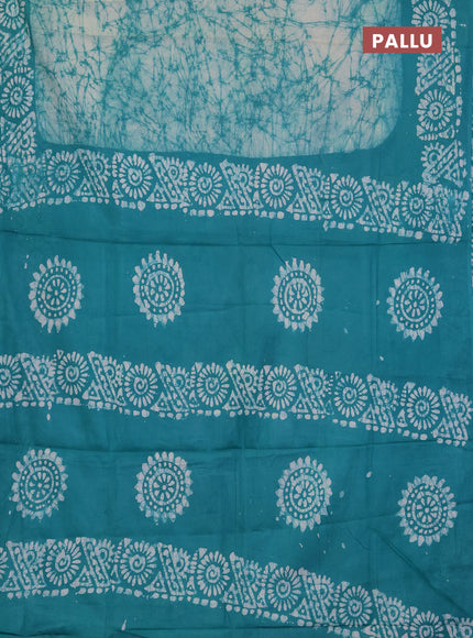 Batik cotton saree teal green with allover prints and batik printed border