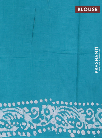 Batik cotton saree teal green with allover prints and batik printed border