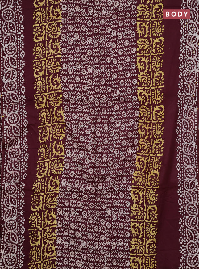 Batik cotton saree deep wine shade with allover prints and batik printed border