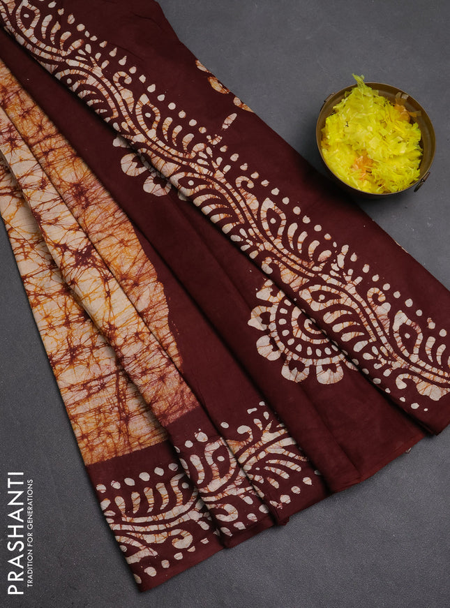 Batik cotton saree mustard yellow and deep maroon with allover prints and batik printed border