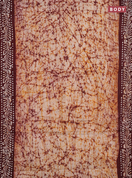 Batik cotton saree mustard yellow and deep maroon with allover prints and batik printed border