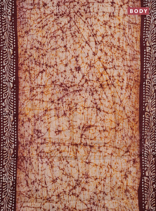 Batik cotton saree mustard yellow and deep maroon with allover prints and batik printed border