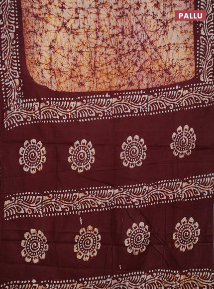 Batik cotton saree mustard yellow and deep maroon with allover prints and batik printed border
