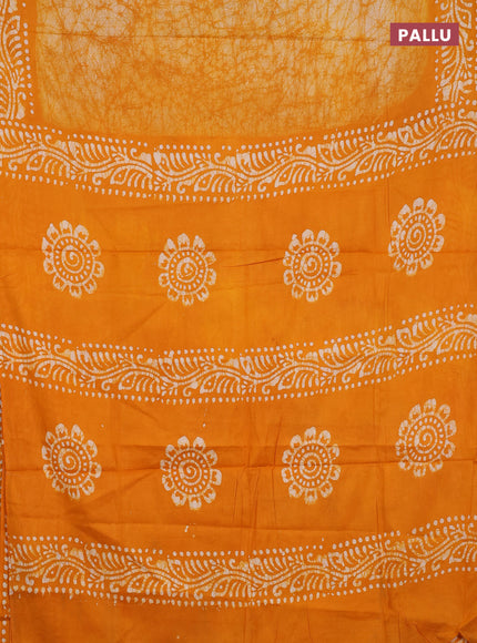 Batik cotton saree mango yellow with allover prints and batik printed border