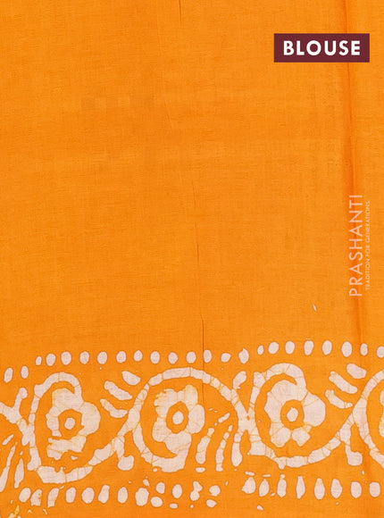 Batik cotton saree mango yellow with allover prints and batik printed border