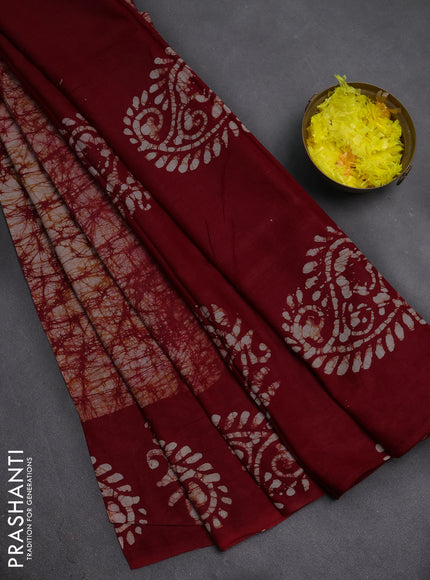 Batik cotton saree rust shade with allover prints and batik printed border