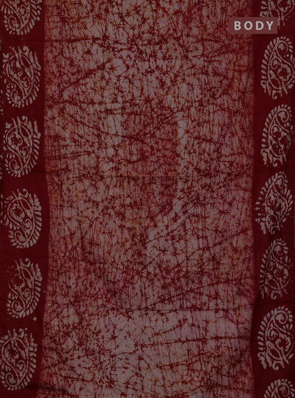 Batik cotton saree rust shade with allover prints and batik printed border