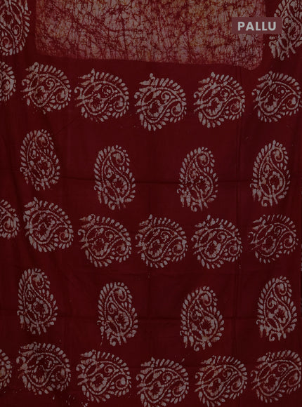 Batik cotton saree rust shade with allover prints and batik printed border