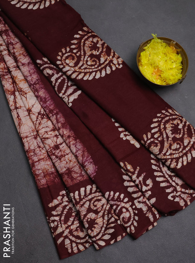 Batik cotton saree beige and deep maroon with allover prints and batik printed border