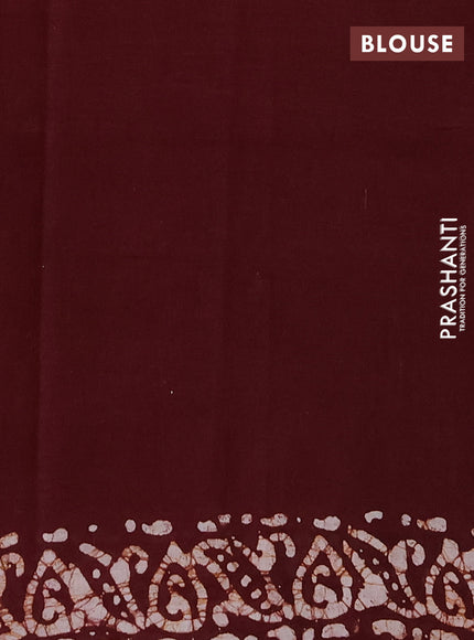 Batik cotton saree beige and deep maroon with allover prints and batik printed border