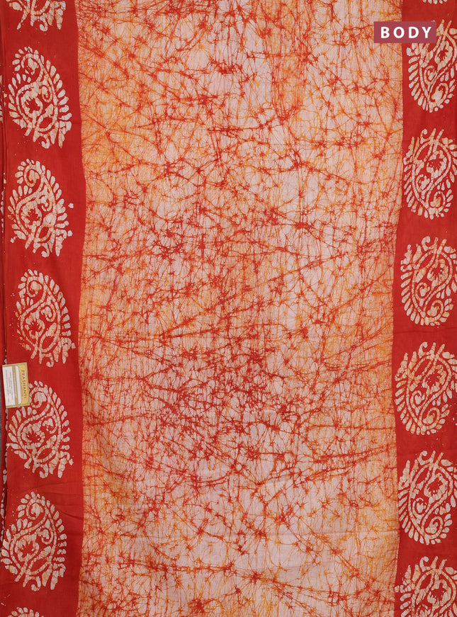 Batik cotton saree rust shade with allover prints and batik printed border