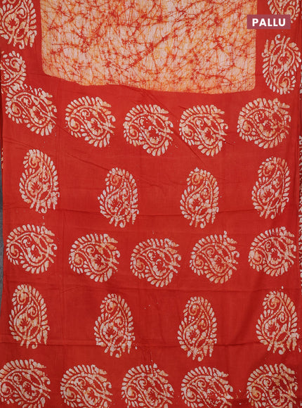 Batik cotton saree rust shade with allover prints and batik printed border
