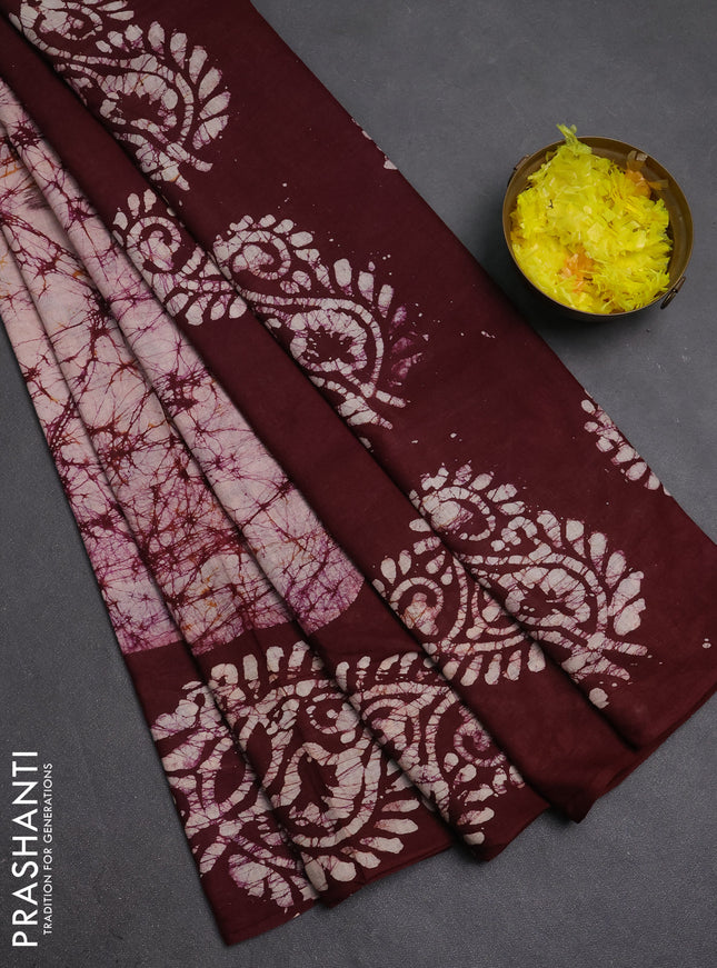 Batik cotton saree deep wine shade with allover prints and batik printed border