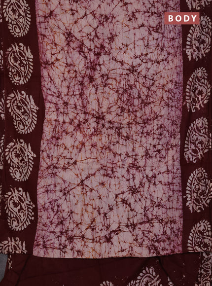 Batik cotton saree deep wine shade with allover prints and batik printed border