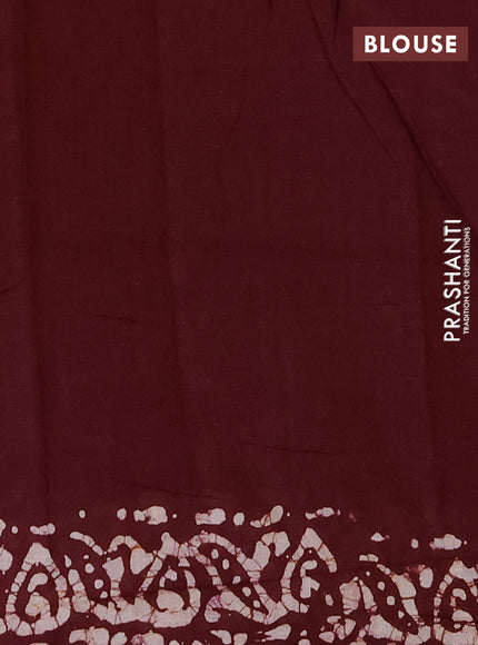 Batik cotton saree deep wine shade with allover prints and batik printed border