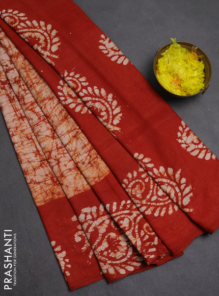 Batik cotton saree rust shade with allover prints and batik printed border