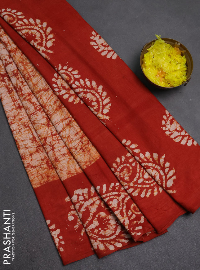Batik cotton saree rust shade with allover prints and batik printed border