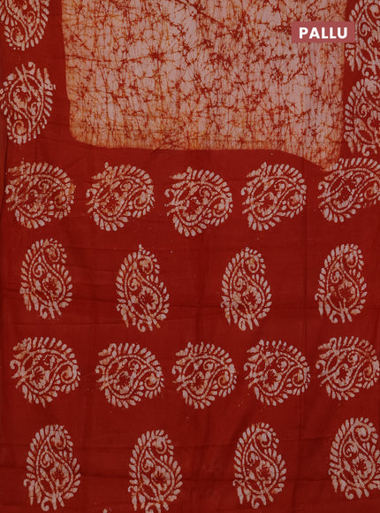 Batik cotton saree rust shade with allover prints and batik printed border