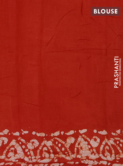 Batik cotton saree rust shade with allover prints and batik printed border