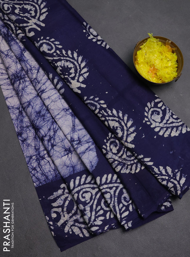 Batik cotton saree navy blue with allover prints and batik printed border