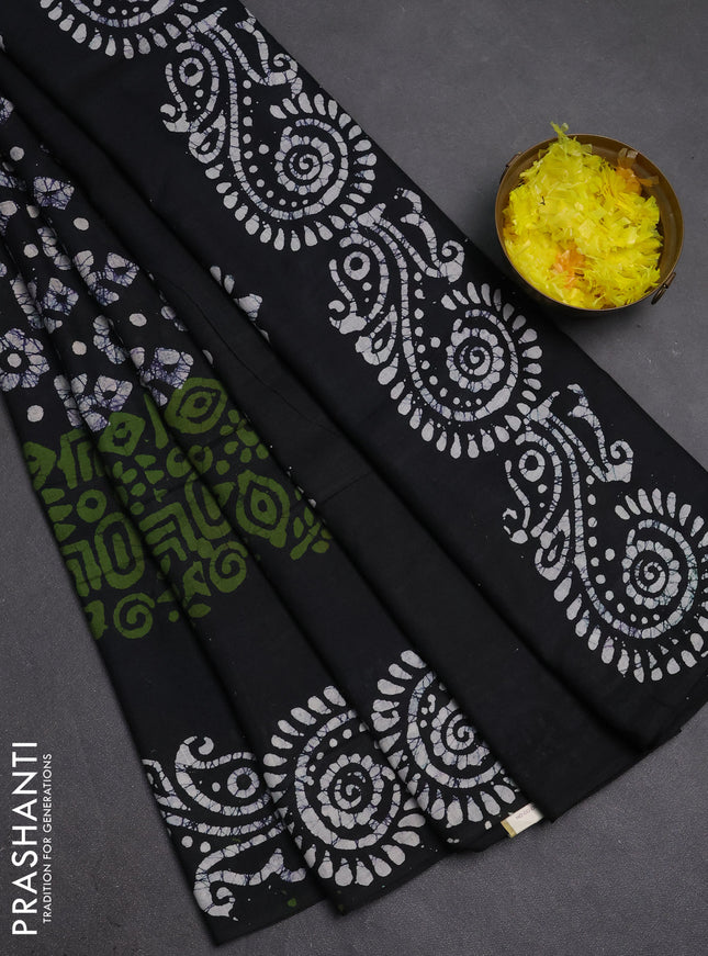 Batik cotton saree mehendi green and bottle green with allover prints and batik printed border