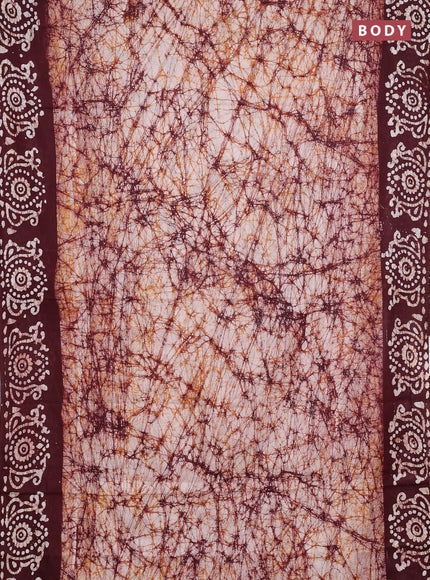 Batik cotton saree deep maroon with allover prints and batik printed border