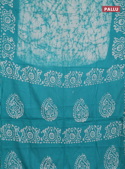 Batik cotton saree teal green with allover prints and batik printed border
