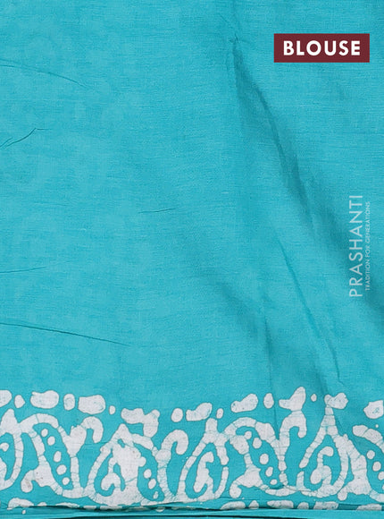 Batik cotton saree teal green with allover prints and batik printed border