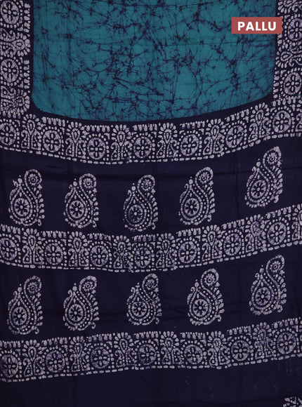 Batik cotton saree green and navy blue with allover prints and batik printed border