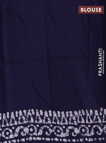 Batik cotton saree green and navy blue with allover prints and batik printed border
